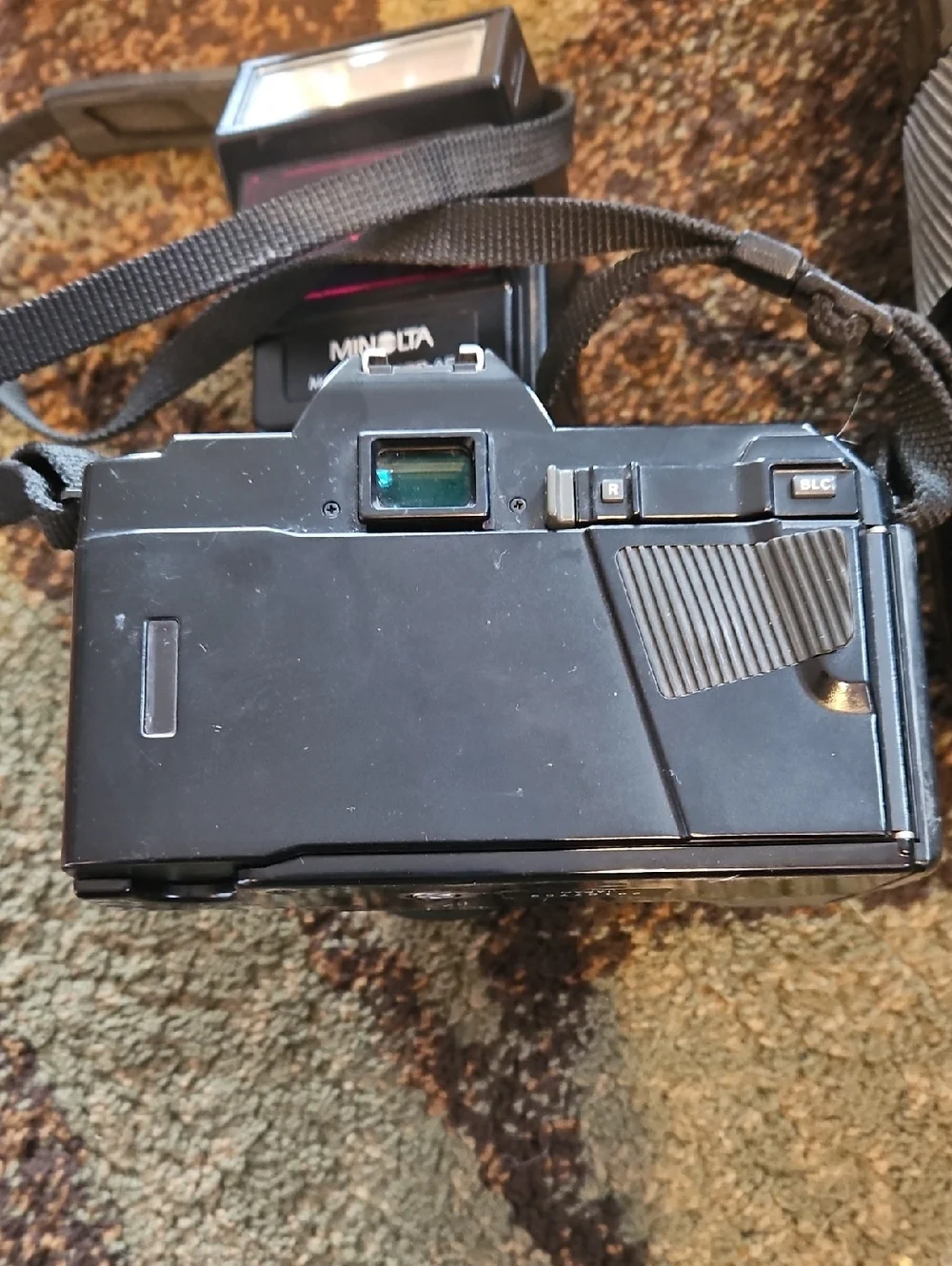 Minolta 35mm Camera With Flash And Telephoto Lense